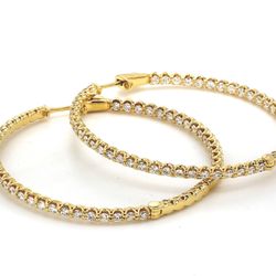 1.80'  Inside out hoop earrings in 18K YG with U-prong set (100) round diamonds.  D3.10ct.t.w.