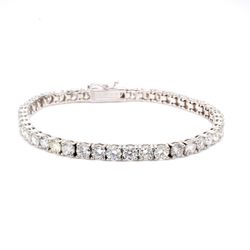 7' Tennis bracelet in 18K WG with 4-prong set (44) round diamonds.  D9.91ct.t.w.