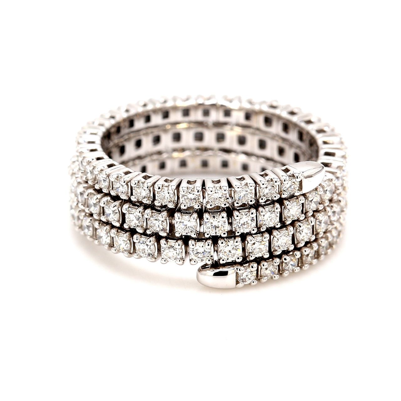 Flexible eternity tri-band style swirl band in 18K gold with pre-set round diamonds.  D1.20ct.t.w.
