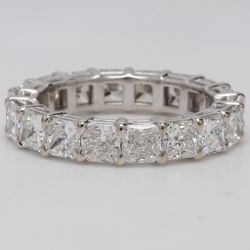 Eternity band in platinum with basket prong set F+/VS+ (18) square radiant diamonds.  D4.41ct.t.w.  Size 6.5