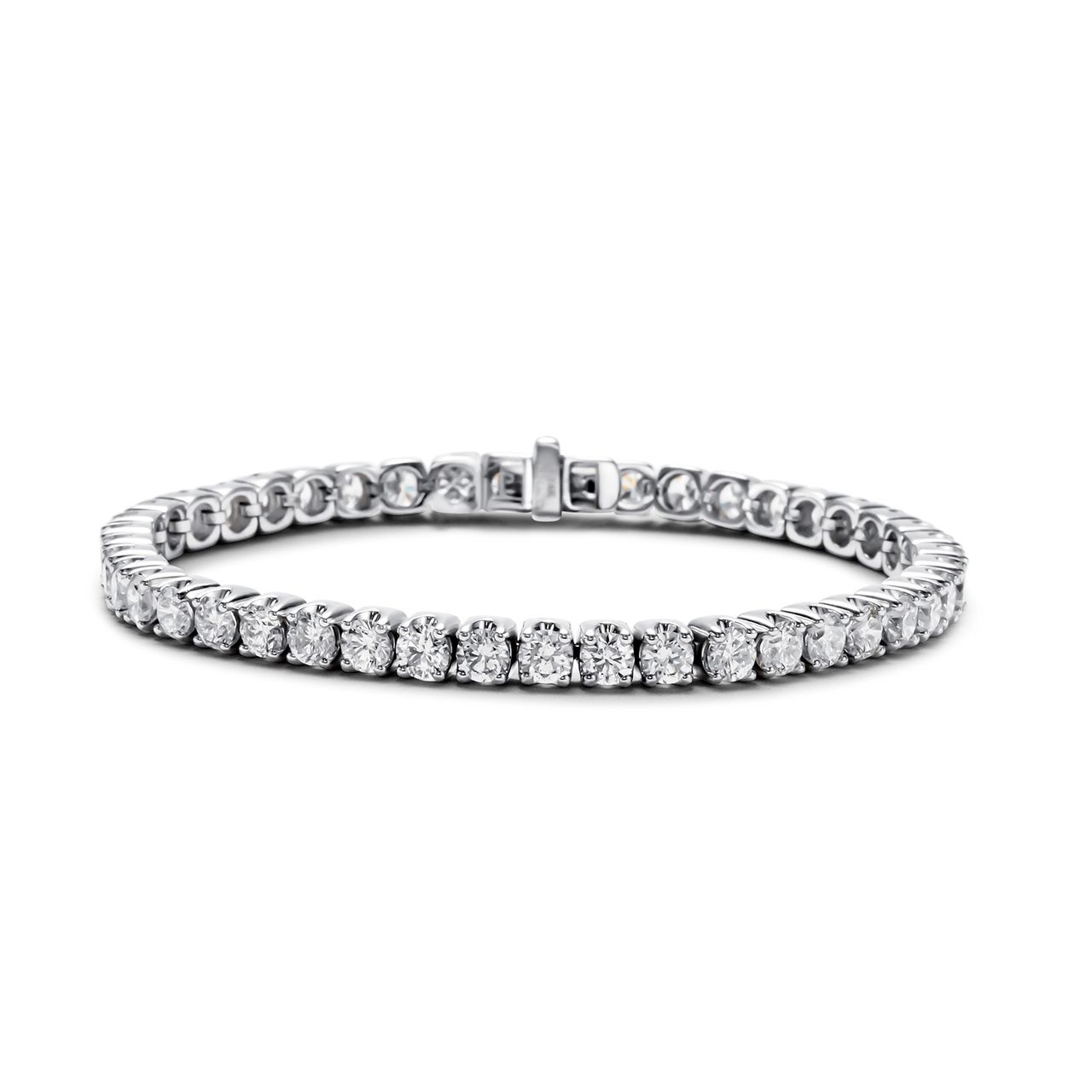 7' Tennis bracelet with crown head prong set (45) round diamonds.  D9.00ct.t.w.