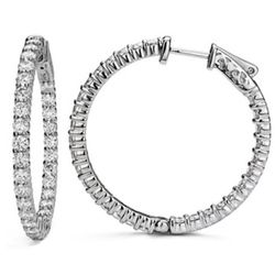 1.25' Inside out hoop earrings with shared prong set round diamonds.  D1.61ct.t.w.