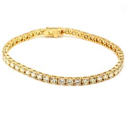 7' Tennis bracelet with basket prong set (48) round diamonds.  D7.74ct.t.w.