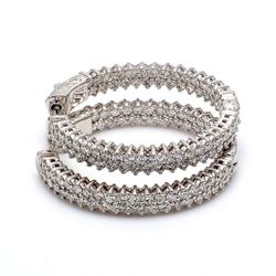 1.25' Inside out hoop earrings with 2-row prong set (146) round diamonds & with special spring lock.  D3.04ct.t.w.