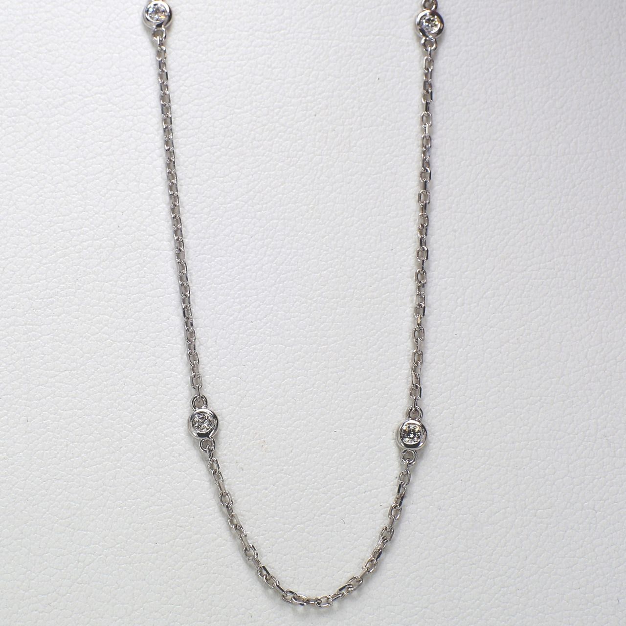 18' Diamonds by the yard necklace with bezel set (10) round diamonds.  D0.26ct.t.w.