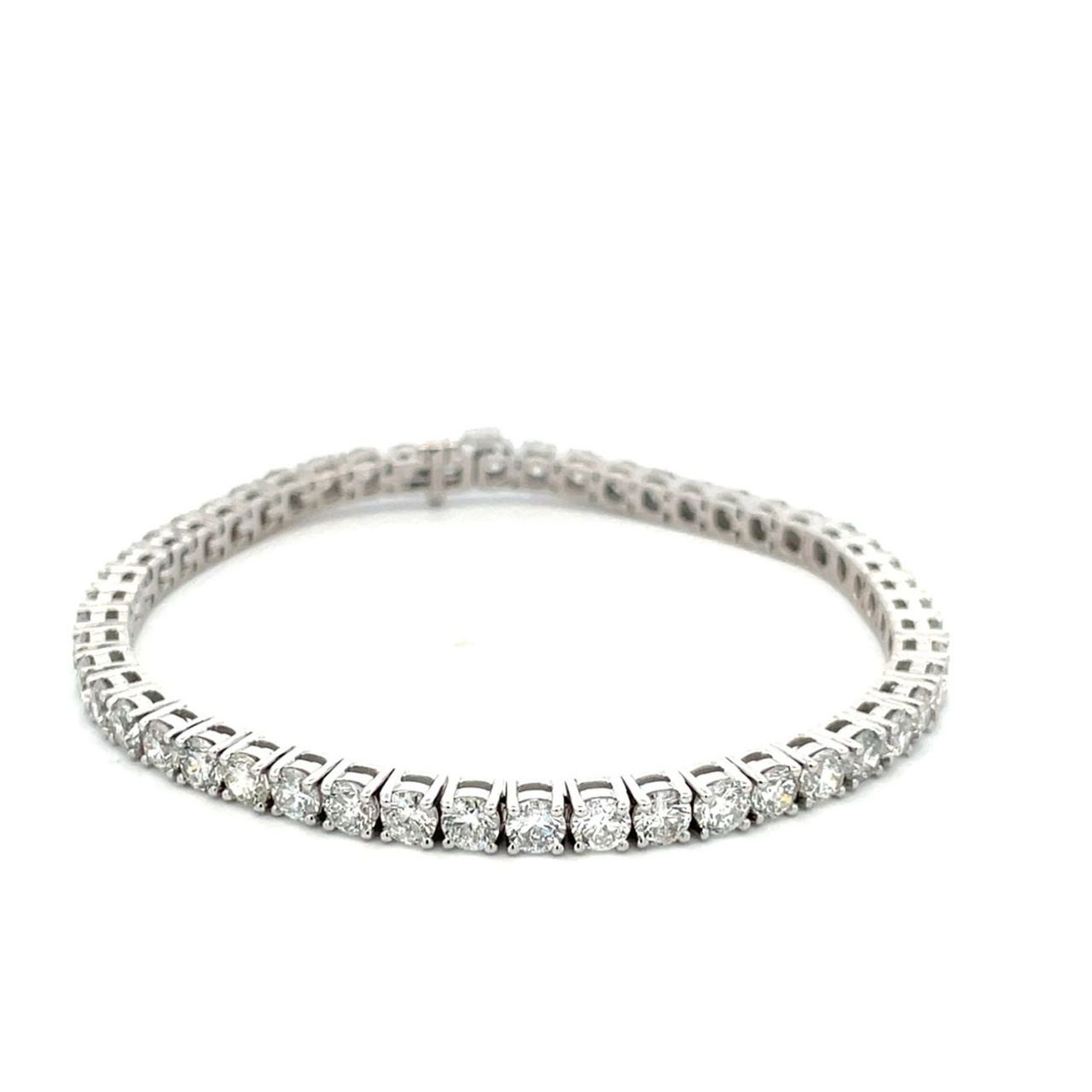 7' Tennis bracelet with basket 4-prong set (50) round diamonds.  D9.50ct.t.w.