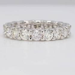 Eternity band in platinum with U-prong set (18) round diamonds.  D2.80ct.t.w.  Size 6.5