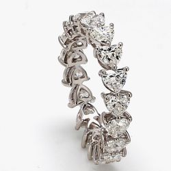 Eternity band east to west style in 18K WG w/ (18) heart shape diamonds.  D3.55ct.t.w.  Size 6.75