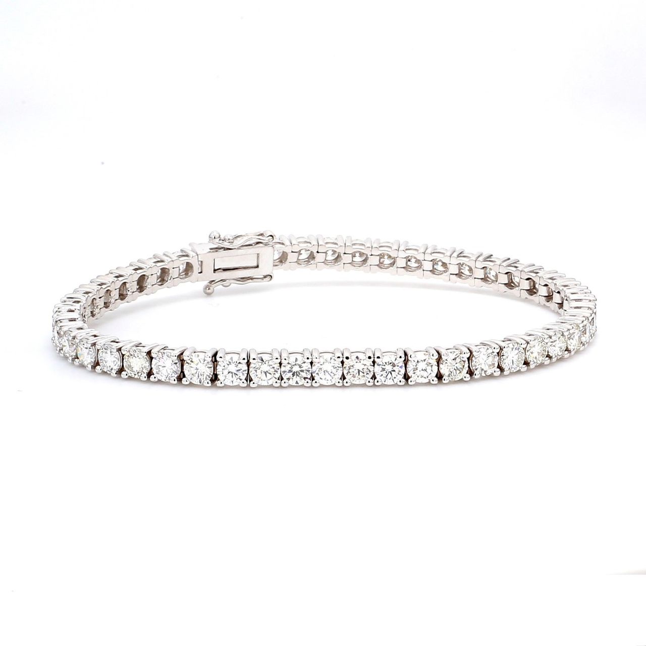 7' Tennis bracelet in 18K WG with 4-prong set (47) round diamonds.  D8.07ct.t.w.