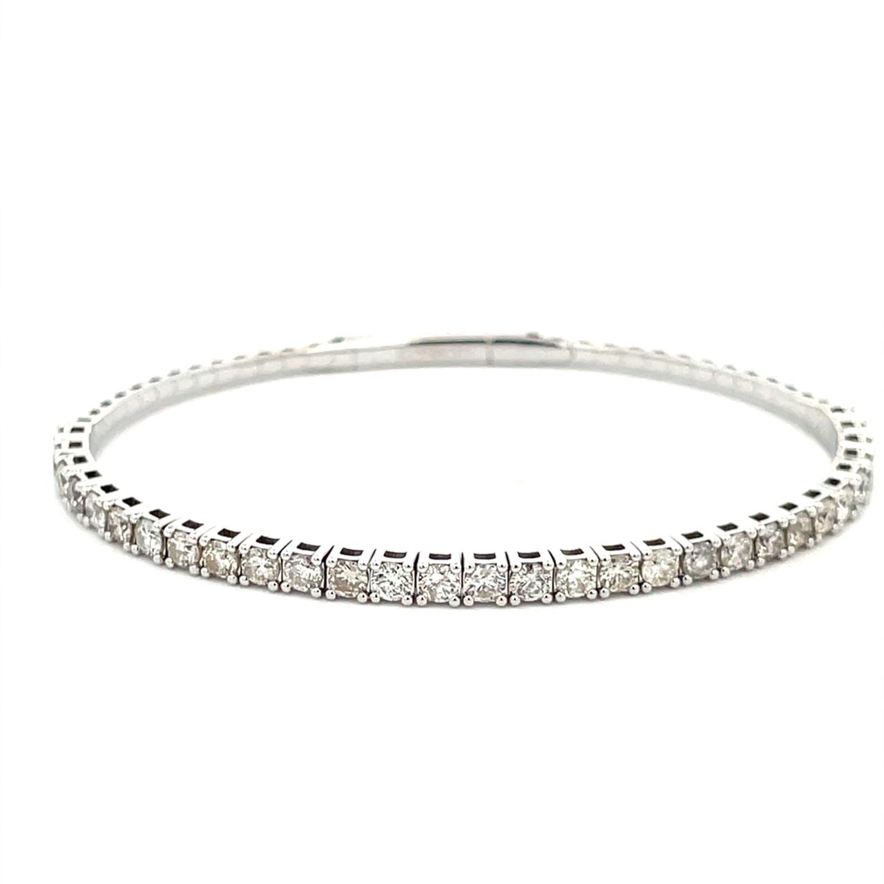6.5' Light weight flexible oval shaped bangle with prong set round diamonds.  D1.85ct.t.w.