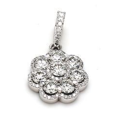 0.75' Flower pendant with halo set (7) round diamonds.  D2.83ct.t.w.