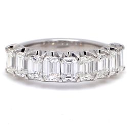 9-stone band in platinum with basket U-prong set emerald cut diamonds.  D1.94ct.t.w.  Size 5