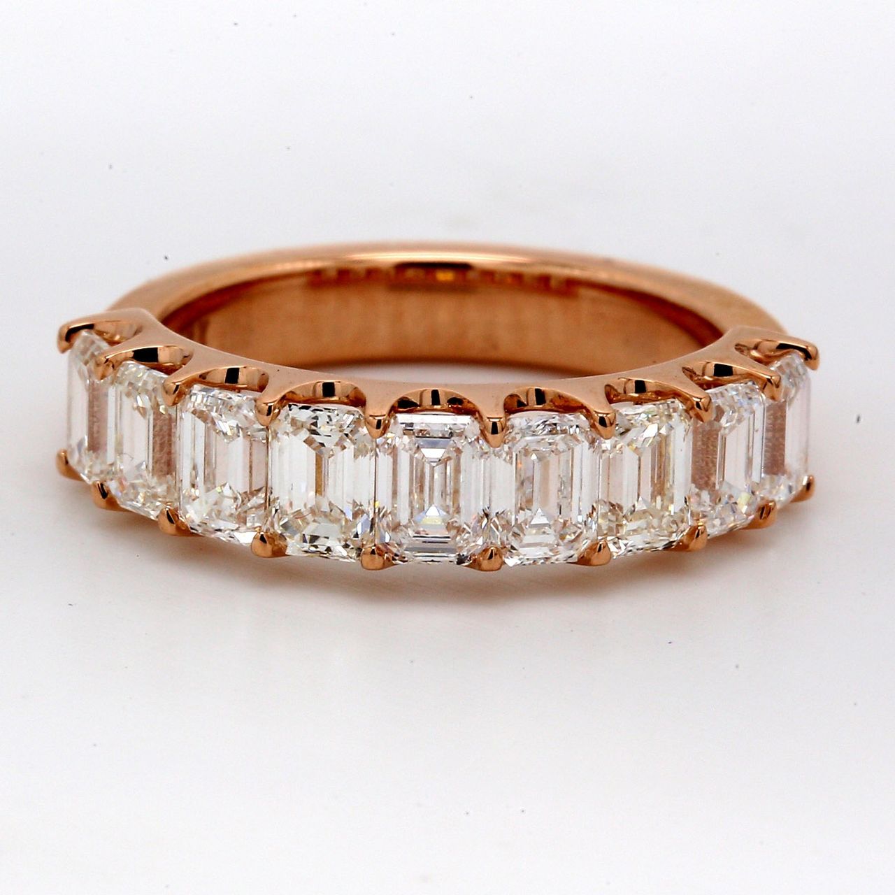 9-stone band in 18K RG with U-prong set (9) emerald cut diamonds.  D2.40ct.t.w.  Size 6