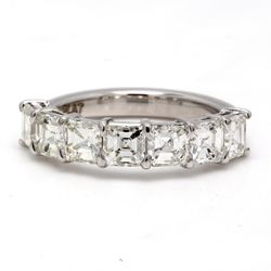 7-stone band in platinum with basket prong set asscher cut diamonds.  D2.26ct.t.w.  Size 5.5