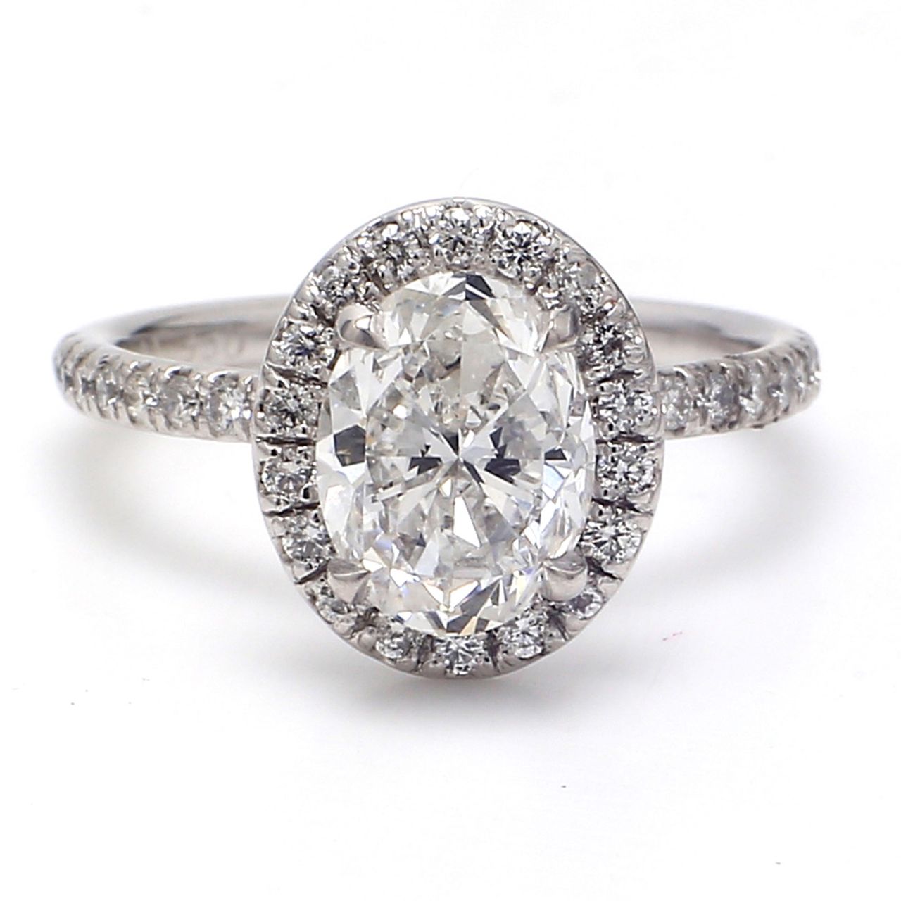 Halo semi-mount in platinum with prong set round diamonds.  D0.42ct.t.w.   Size 7