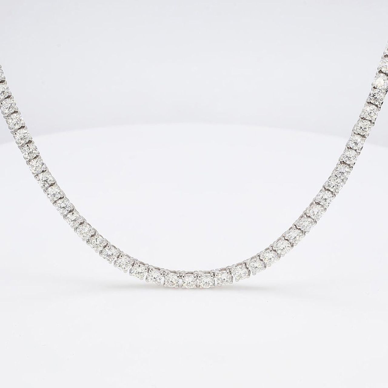 18' Tennis necklace with 4-prong set (182) round diamonds.  D7.92ct.t.w.