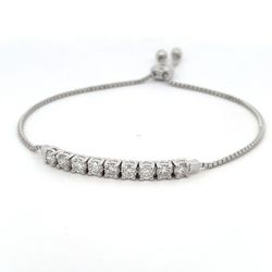 Bolo style bracelet with prong set round diamonds.  D1.12ct.t.w.