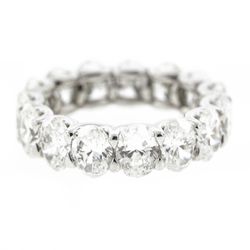 Eternity band in platinum with shared prong set GIA certified E-G/SI1-SI2 (15) oval diamonds .  D7.56ct.t.w.  Size 6.5