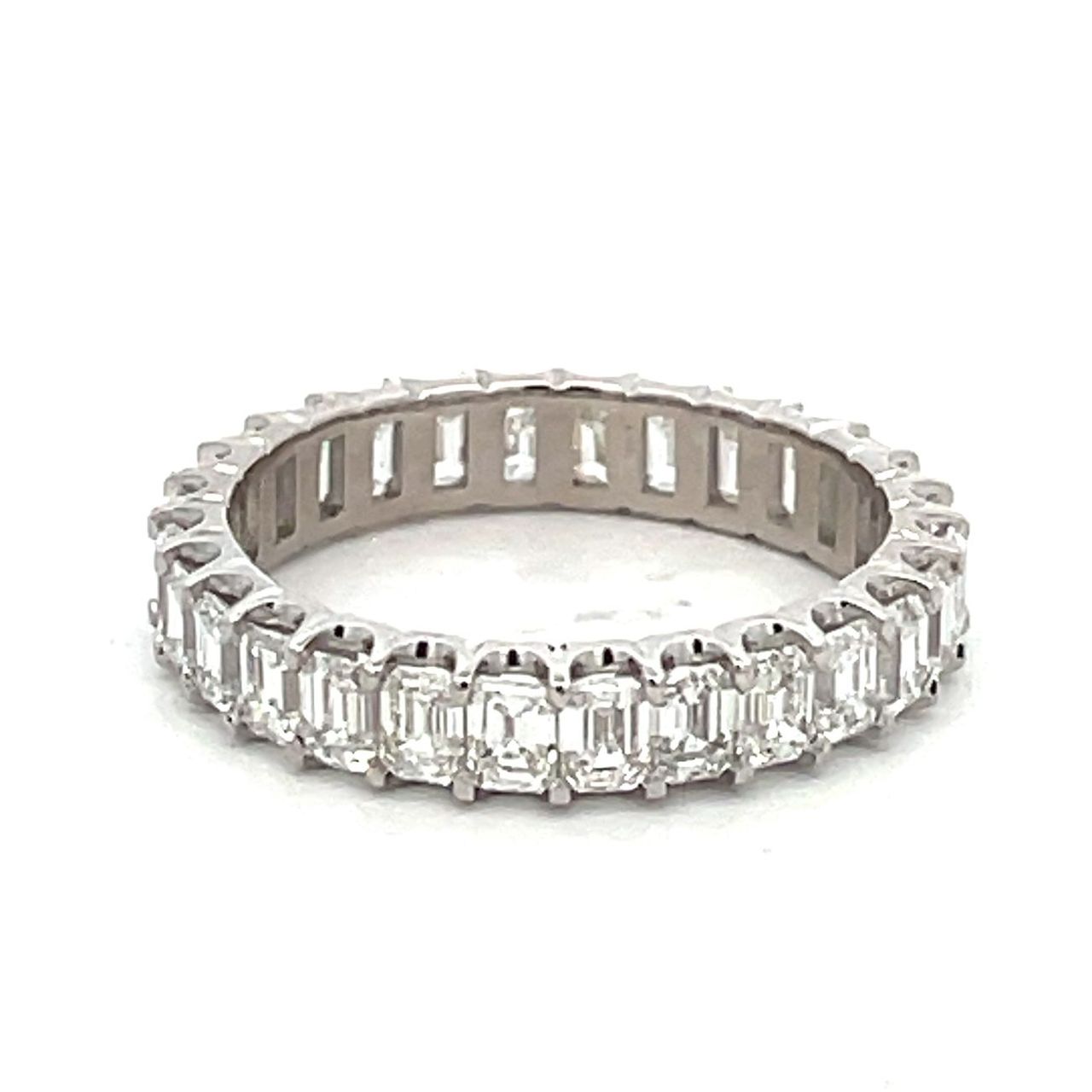 Eternity band in platinum with prong set (28) emerald cut diamonds.  D2.43ct.t.w.  Size 5.75