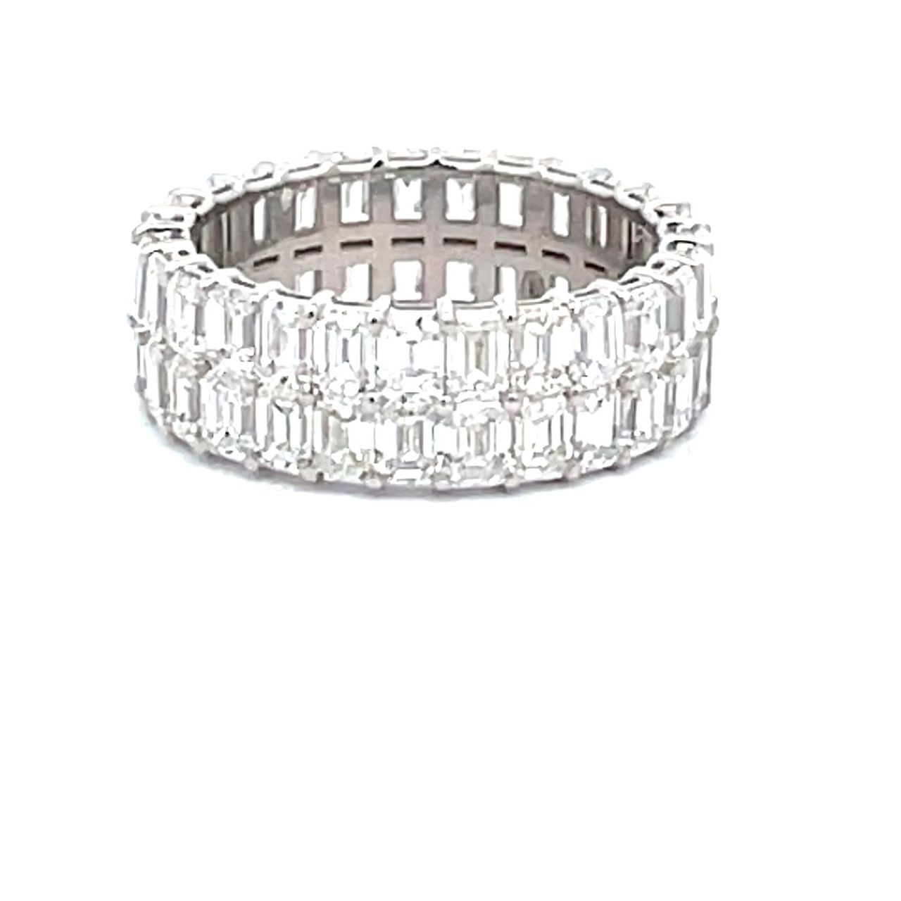 Two-row eternity band in 18K WG with prong set (54) emerald cut diamonds.  D4.97ct.t.w.  Size 5