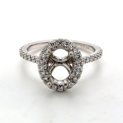 Halo semi-mount with U-prong set round diamonds.  D0.41ct.t.w.  Size 6.75