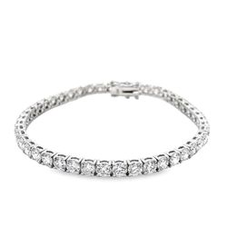 7' Tennis bracelet 18K WG with basket prong set (44) round diamonds.  D10.80ct.t.w.