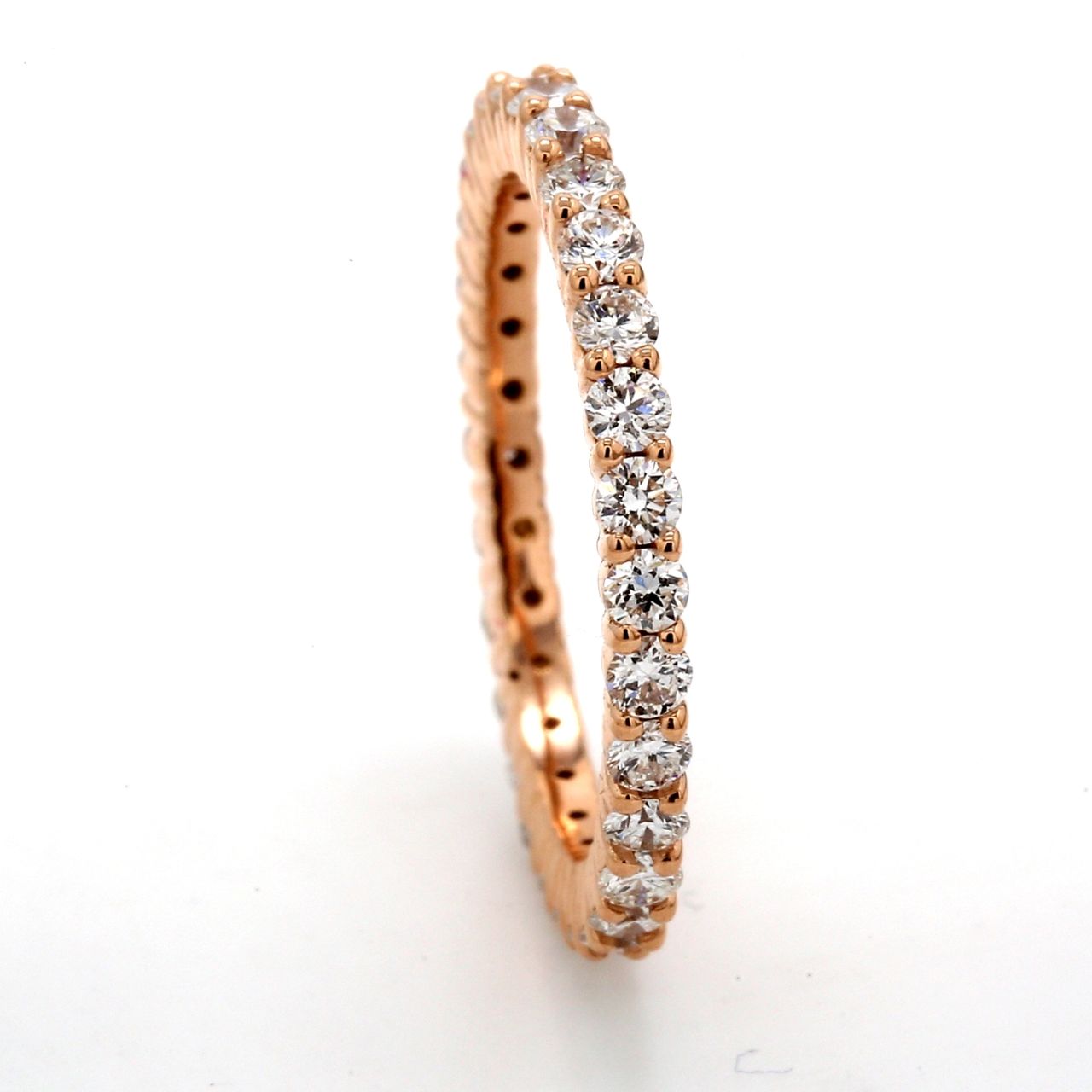Eternity band in 18K RG with prong set (30) round diamonds.  D0.88ct.t.w.  Size 5
