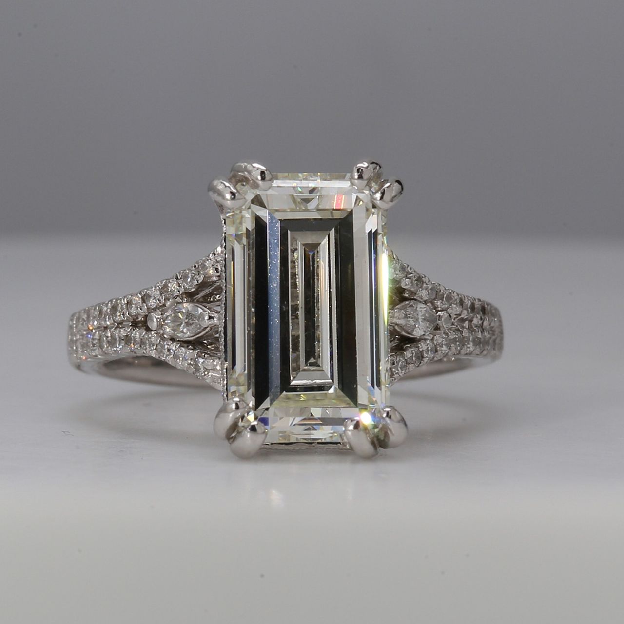 Split-shank semi mount in platinum with U-prong and pave set rounds & prong set marquise diamonds.  D0.64ct.t.w.