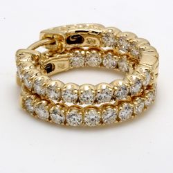 0.75' Inside out hoop earrings  with prong set (30) round diamonds.  D1.51ct.t.w.