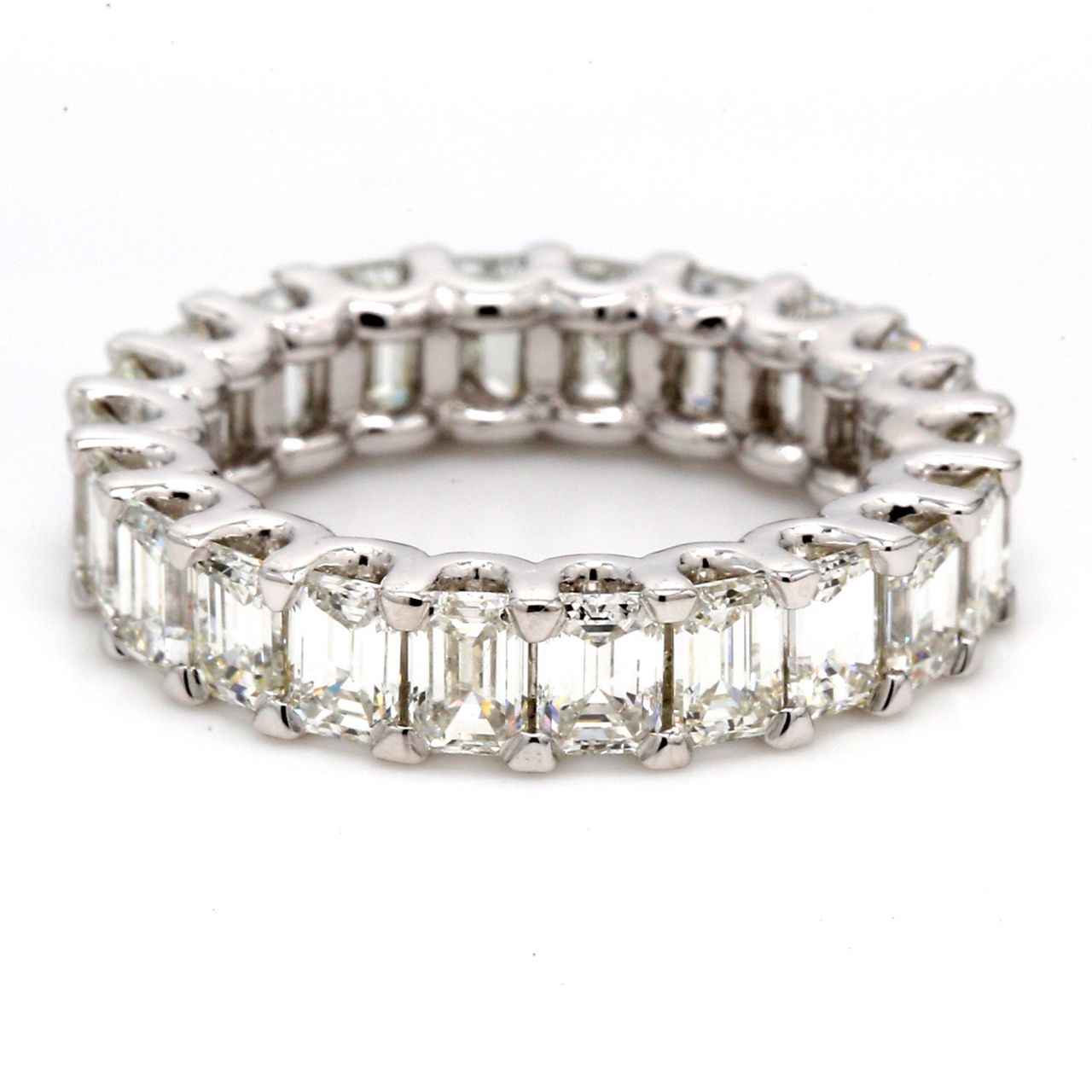 Eternity band in platinum with U-prong set (22) emerald cut diamonds.  D3.50ct.t.w.  Size 5