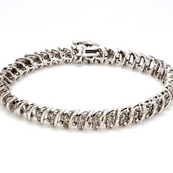 7.5' Bracelet S-style in 10K WG with prong set round diamonds.  D2.00ct.t.w.