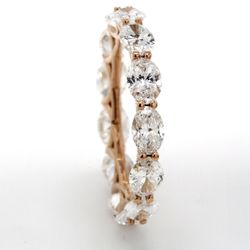 Eternity band in 18K RG with prong set sideway (13) oval cut diamonds.  D3.78ct.t.w.  Size 6.75