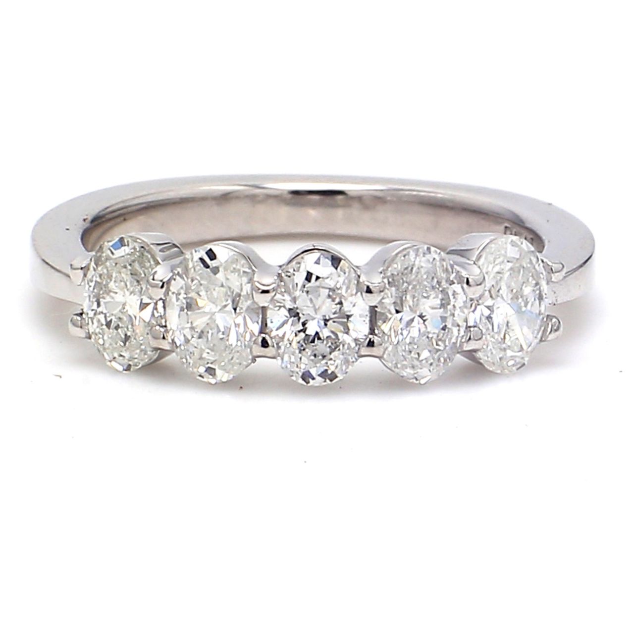 5-stone band in platinum with basket prong set oval cut diamonds.  D1.17ct.t.w.  Size 5.5