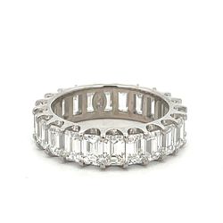 Eternity band in platinum with U-prong set (22) emerald cut diamonds.  D5.40ct.t.w.  Size 6