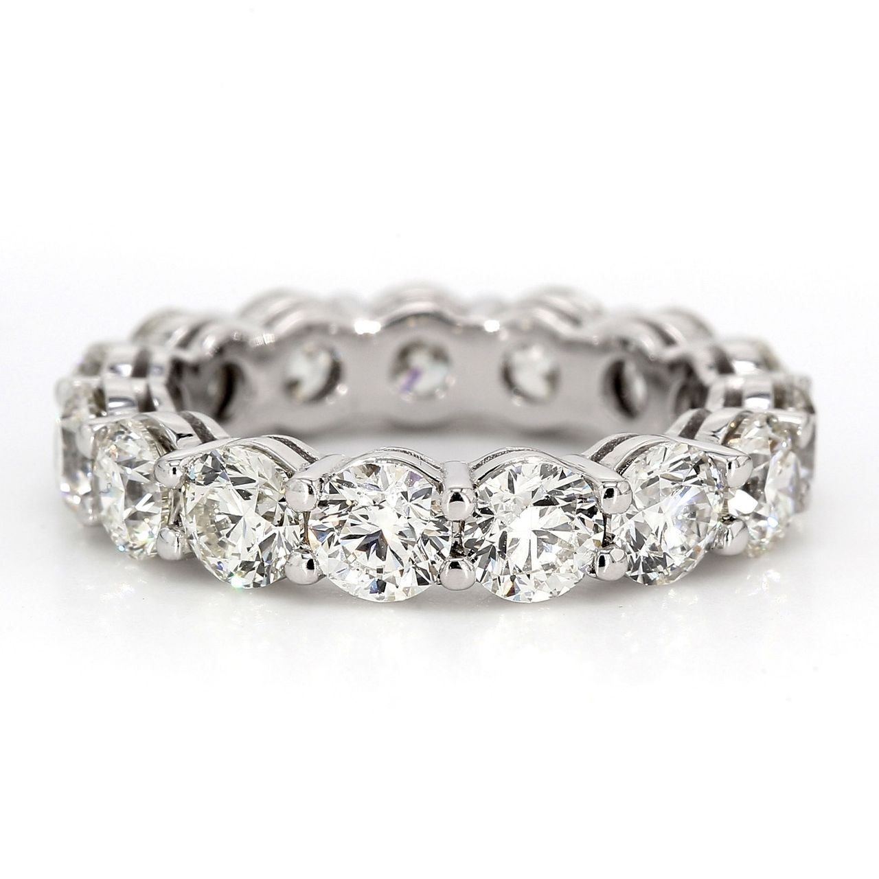 Eternity band in platinum with shared prong set (15) round diamonds.  D5.45ct.t.w.  Size 6.25