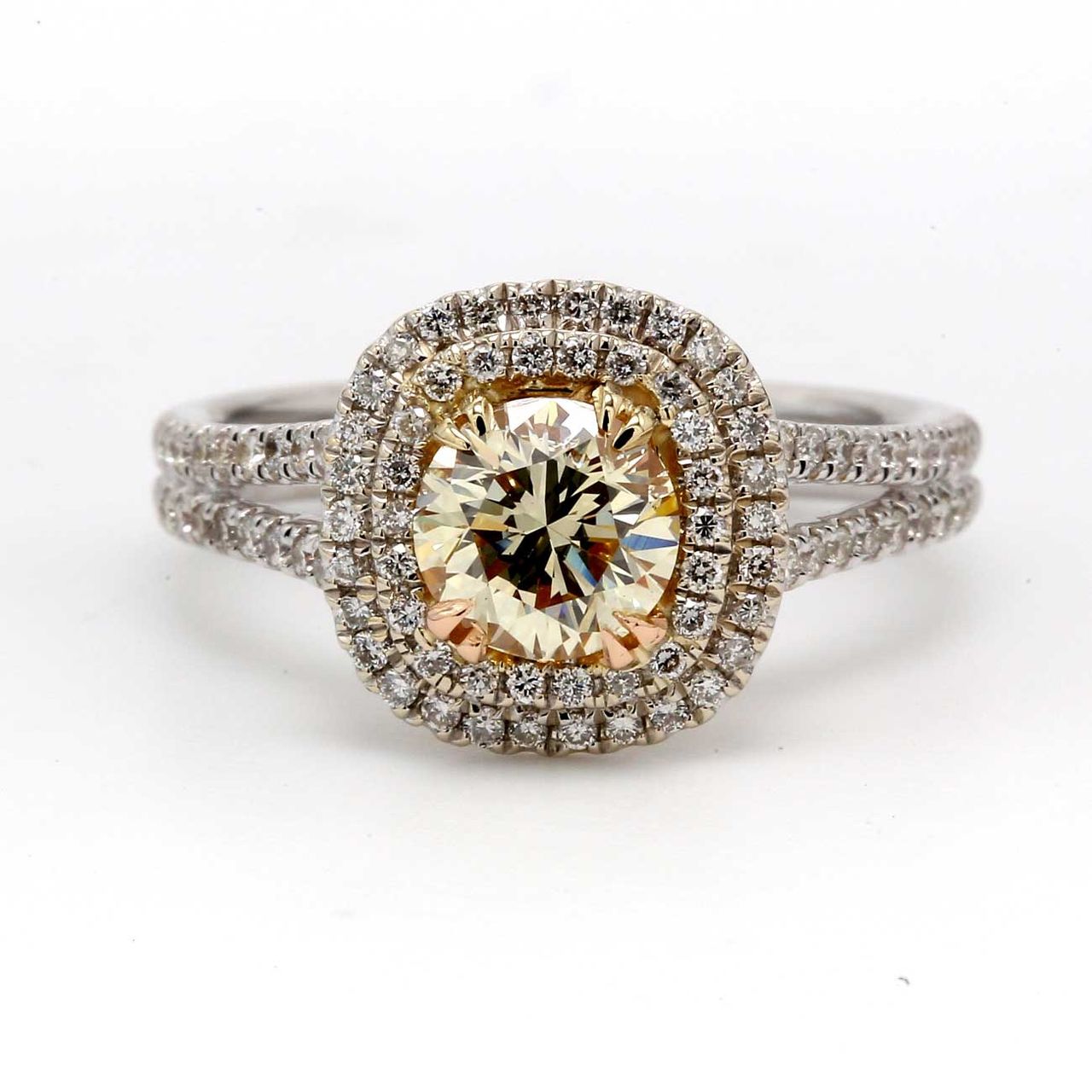 Double halo split-shank semi-mount in 18K WG with pre-set round diamonds.  D0.45ct.t.w.