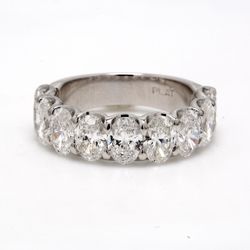 9-stone band in platinum with prong set oval cut diamonds.  D2.79ct.t.w.  Size 4.5