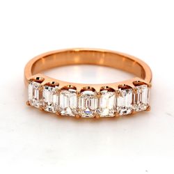 7-stone band in 18K RG with shared prong set emerald cut diamonds.  D1.34ct.t.w.  Size 6.25