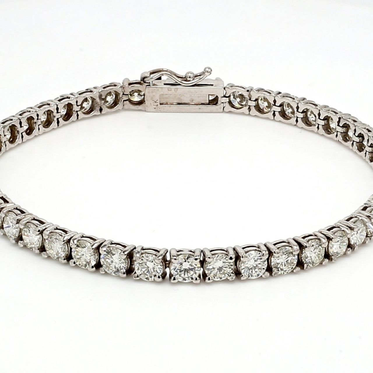 7' Tennis bracelet with 4-prong claw set (36) round diamonds.  D14.56ct.t.w.