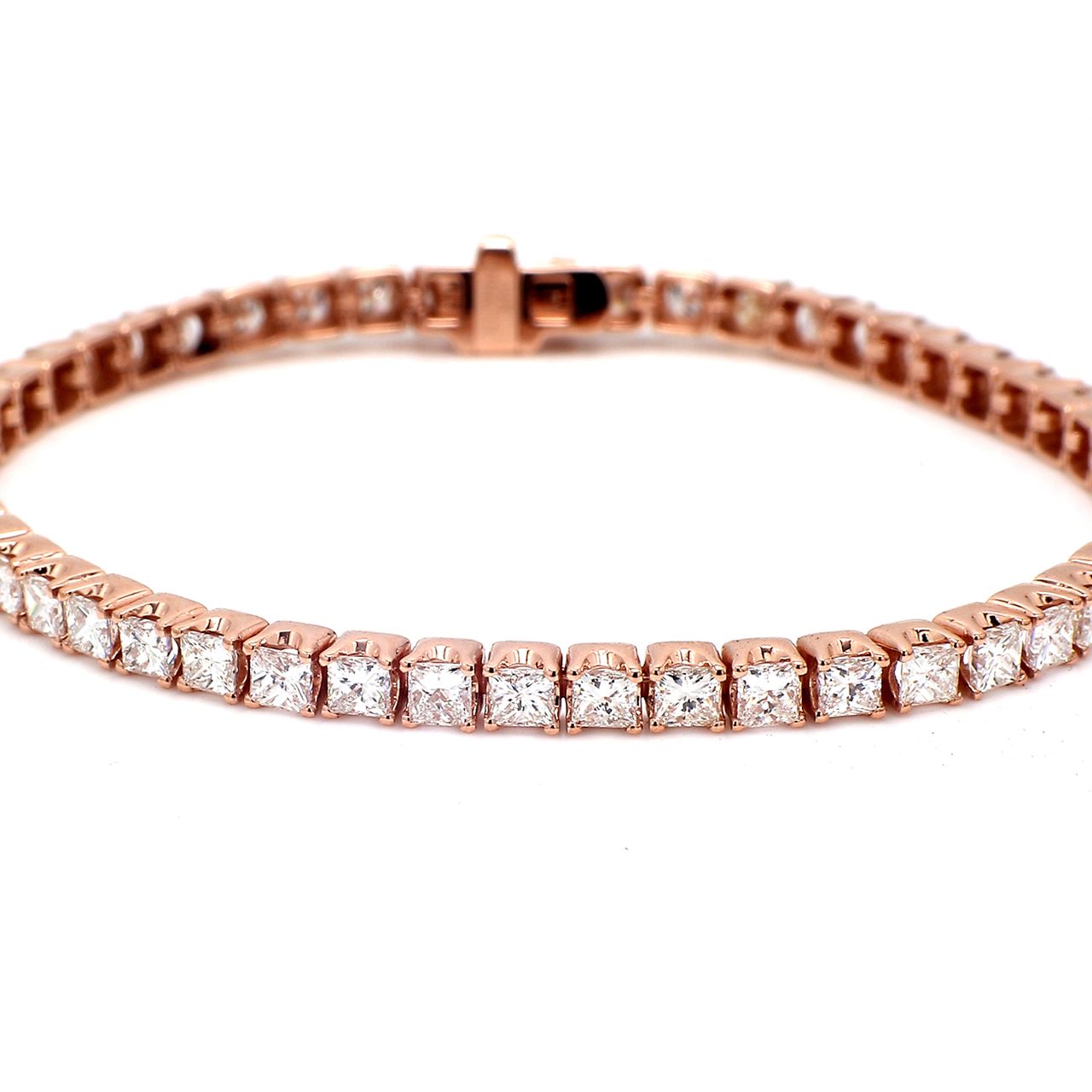 7' Tennis bracelet in 14K RG with raised prong set (51) princess cut diamonds.  D7.06ct.t.w.
