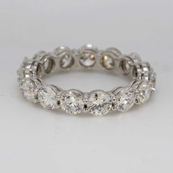 Etenity band in platinum with double basket shared prong set round diamonds.  D3.56ct.t.w.  Size 5.25