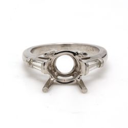 3-stone semi mount in platinum with baguette diamond sides.  D0.42ct.t.w.