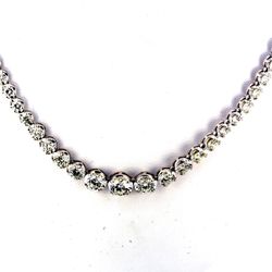 17' Graduating tennis necklace with basket crown head, prong set (107) round diamonds.  D10.20ct.t.w.  (Center - 0.63ct.)