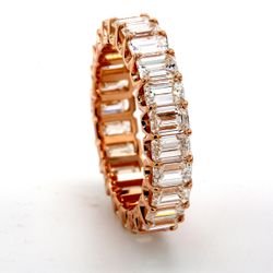 Eternity band in 18K RG with U-shape (24) emerald cut diamonds.  D4.44ct.t.w.  Size 5.75