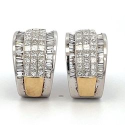 French clip earrings in 2-tone with raised 3-row invisible set princess cuts and channel set baguette diamonds.  D5.50ct.t.w.