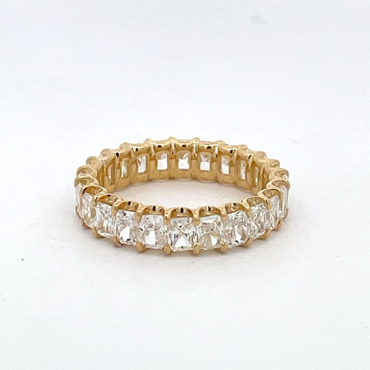 Eternity band in 18K YG with U-prong set (24) radiant cut diamonds.  D3.83ct.t.w.  Size 6.75
