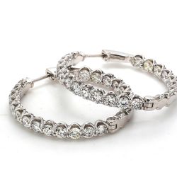 1.20' Inside out hoop earrings with U-prong set round diamonds.  D7.48ct.t.w.