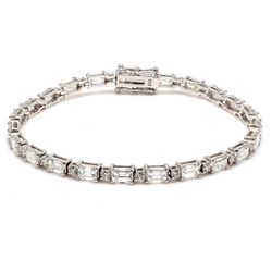 7' Tennis bracelet in 18K WG with alternating 4-prong set (23) round and (23) emerald cut diamonds.  D8.12ct.t.w.