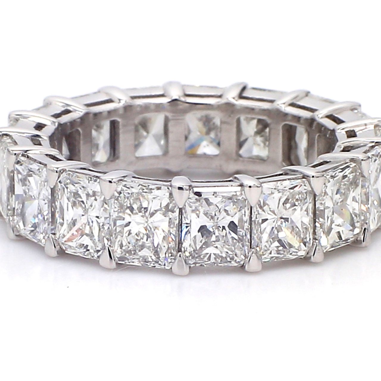 Eternity band in platinum with basket claw set D-G/VS2-SI1 (17) radiant cut diamonds.  D7.00ct.t.w.  Size 5.75