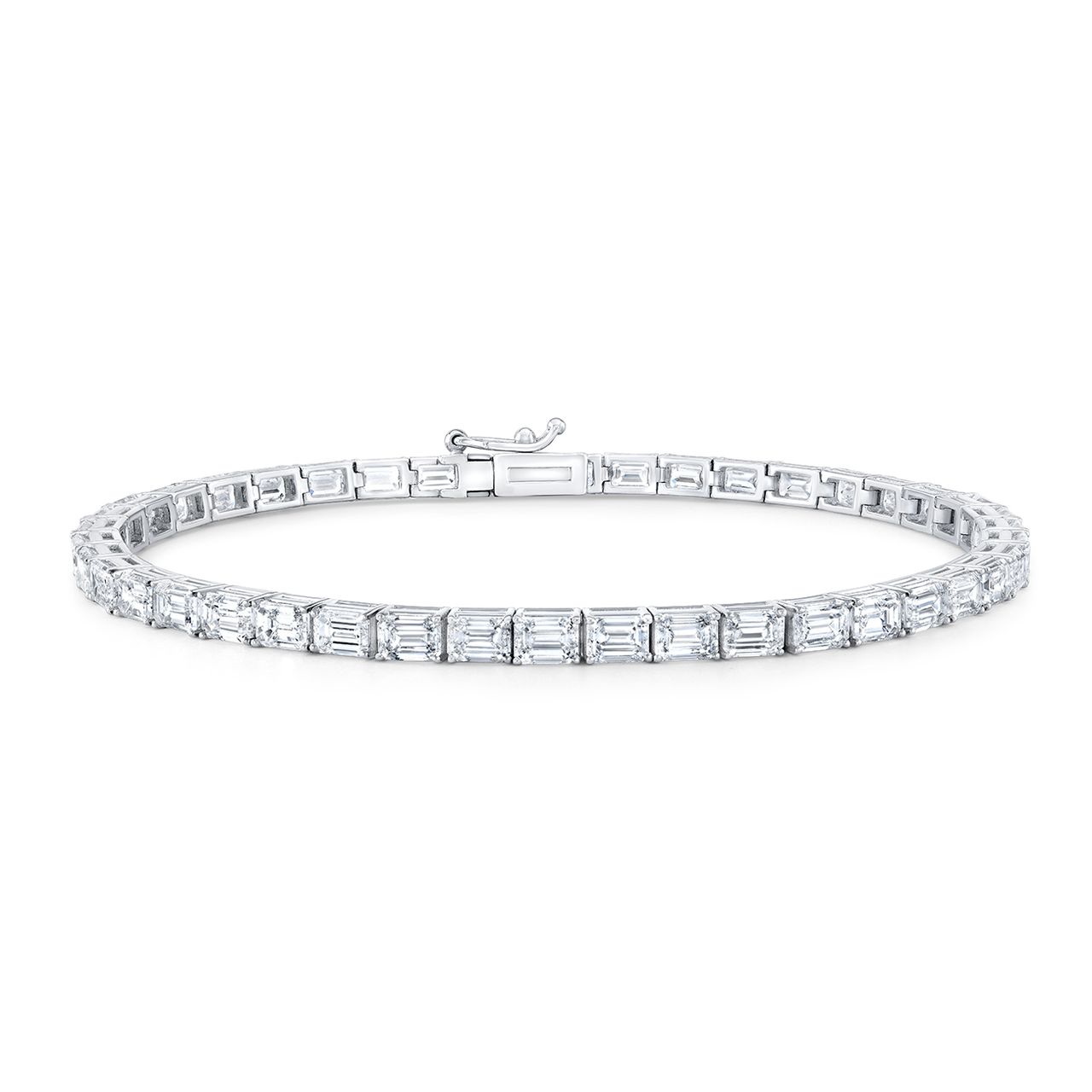 7' East to west style tennis bracelet in platinum with prong basket set emerald cut diamonds.  D10.79ct.t.w.